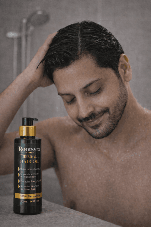 After rinsing in the bathroom, healthy-looking hair with Rootsyra Herbal Hair Oil bottle—morning finish to the ritual.
